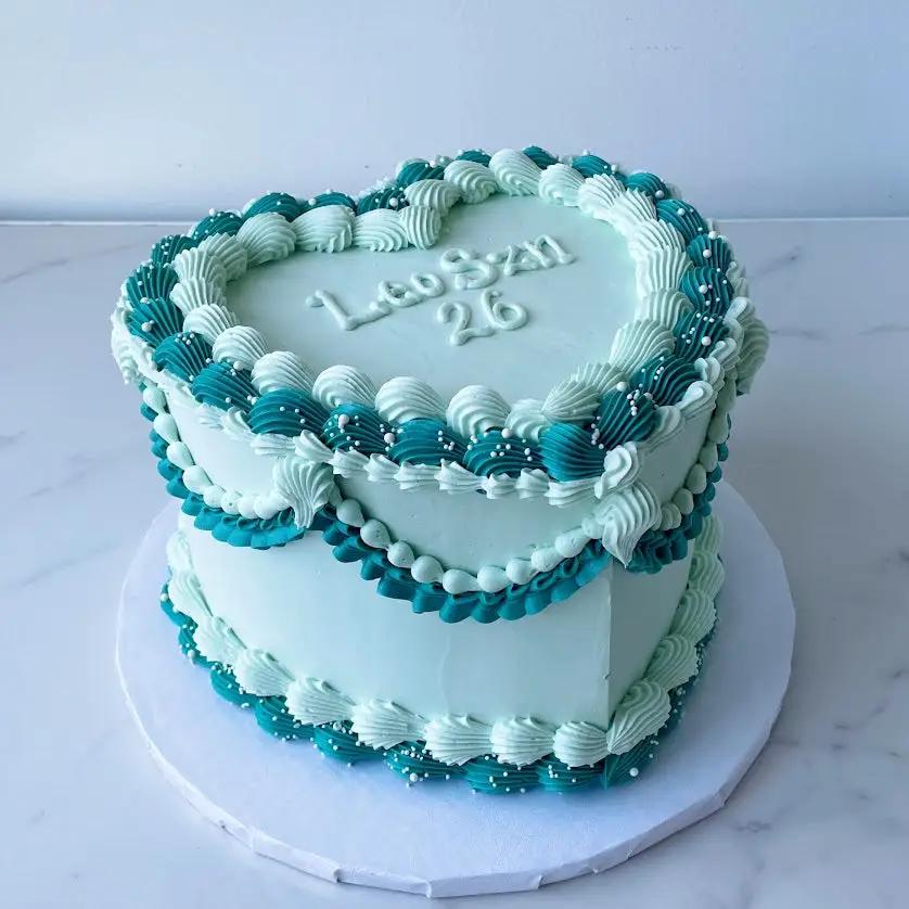 White and Blue Heart Shaped Cake