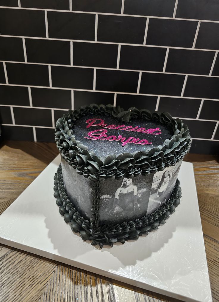 A Heart Cake with images on the side